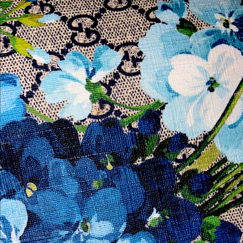 Like new! Gorgeous Gucci with limited blue floral pattern.
